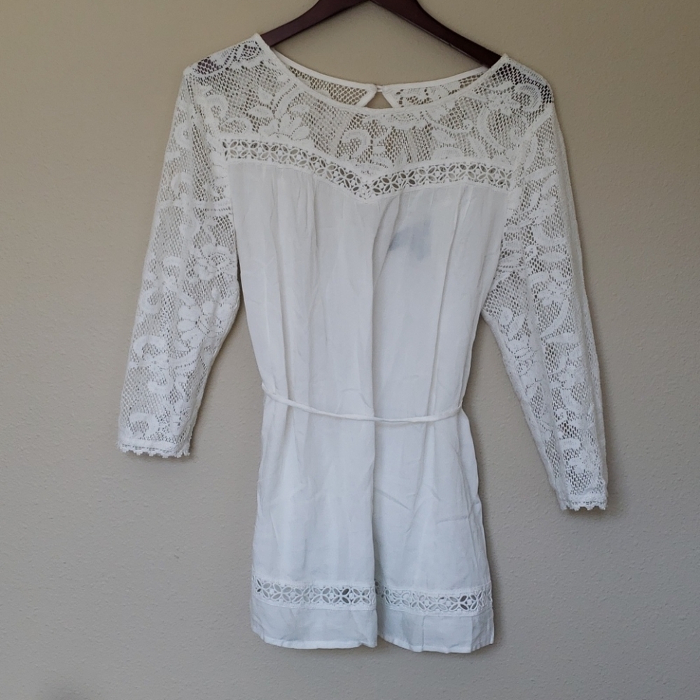 White blouse with lace sleeves